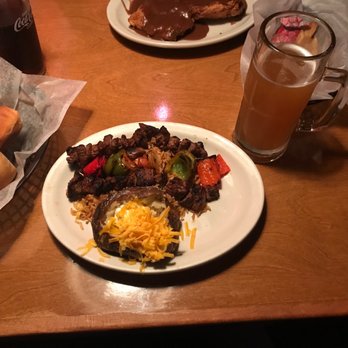 Texas Roadhouse - two plates of food on a table - Steakhouses Near Me - Murrells Inlet, South Carolina Texas Roadhouse - two plates of food on a table - Steakhouses Near Me - Murrells Inlet, South Carolina