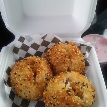 Bom Bom Grill - Koo koo balls...filled with teriyaki chicken hot sauce green onions n rice. (I open them to let the steam out). - Asian Fusion Near Me - Bellflower, California