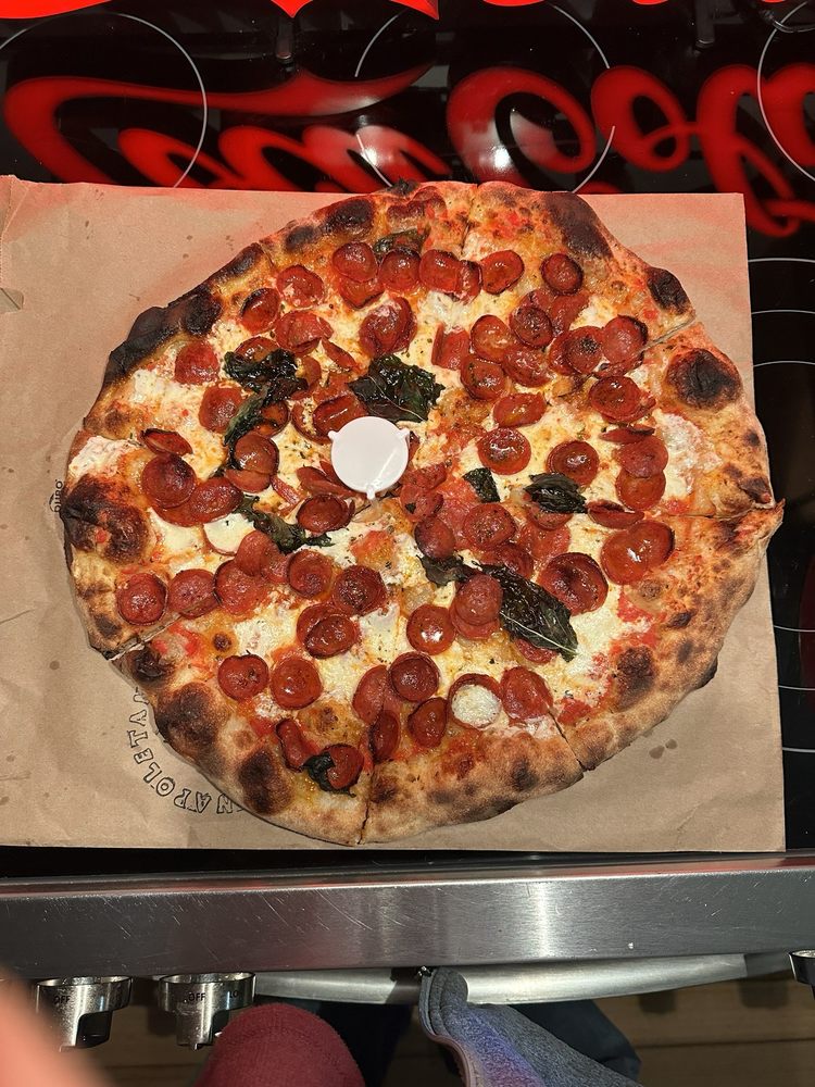 Rhea Pizzeria Napoletana Logo