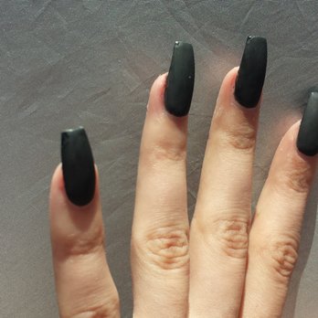 Le's O Nails - shiny bits of nails where the topcoat was not placed properly (taken right after they were done) - Nail Salons Near Me - Oxnard, California
