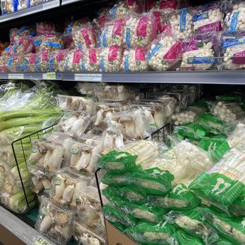 Marché C & T - a display of vegetables in a grocery store - International Grocery Near Me - Montreal, Quebec Marché C & T - a display of vegetables in a grocery store - International Grocery Near Me - Montreal, Quebec