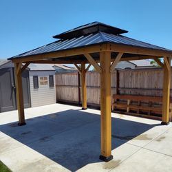Mays & Son - The gazebo they built - next to the shed they built previously.