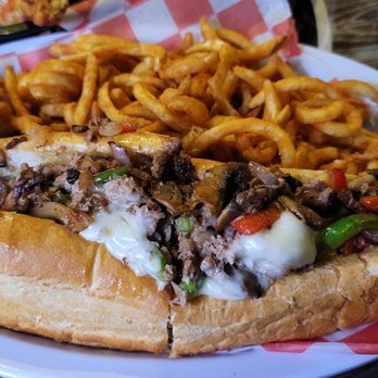 The Draft - a sandwich and fries on a plate - Chicken Wings Near Me - Oceanside, California The Draft - a sandwich and fries on a plate - Chicken Wings Near Me - Oceanside, California