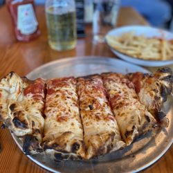 Truckee Brewing Company - Restaurant - Meat lovers calzone with fries & Pilsner.  Great lunch!