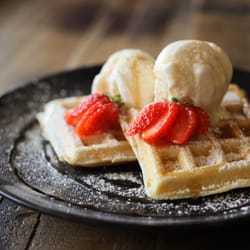 Angels Cafe - Angels Waffles with Strawberries, Ice-cream and warm chocolate fudge sauce.