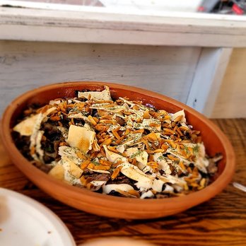 Ayat NYC - Fattat Jaj, a Six layer dish with roasted chicken rice, chickpeas, garlic tahini, crispy pita, sliced almonds, and mint. - Arabic Near Me - Brooklyn, New York Ayat NYC - Fattat Jaj, a Six layer dish with roasted chicken rice, chickpeas, garlic tahini, crispy pita, sliced almonds, and mint. - Arabic Near Me - Brooklyn, New York