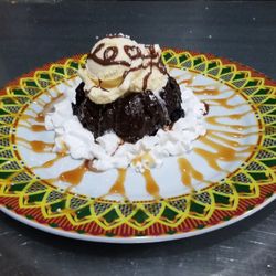 Tijuana Taxi Co - Chocolate Lava Cake: Chocolate cake with a hot fudge center, vanilla ice cream, caramel, chocolate, whipped cream & powdered sugar. YUM!