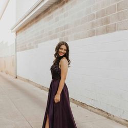 Gown Town - Elegant long dresses with a slit are a flattering look.