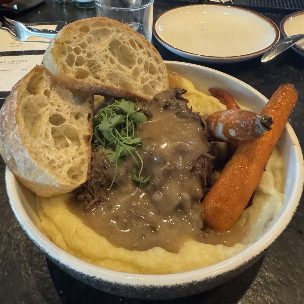 Hill & Vine - Nightly special - Braised Beef $22 - Cocktail Bars Near Me - Fredericksburg, Texas