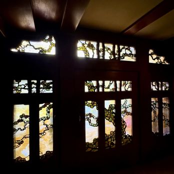 Gamble House - Front entryway looking out. Yes, it is quite dark inside. - Landmarks & Historical Buildings Near Me - Pasadena, California