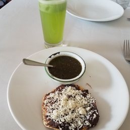 Black bean tostada with an agua of cucumber lime