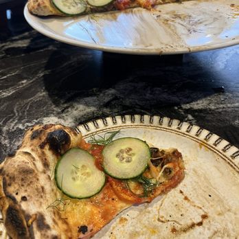 Dixboro Project - Delicious pizza with dill, cucumber, and a special sauce - Breakfast & Brunch Near Me - Ann Arbor, Michigan Dixboro Project - Delicious pizza with dill, cucumber, and a special sauce - Breakfast & Brunch Near Me - Ann Arbor, Michigan