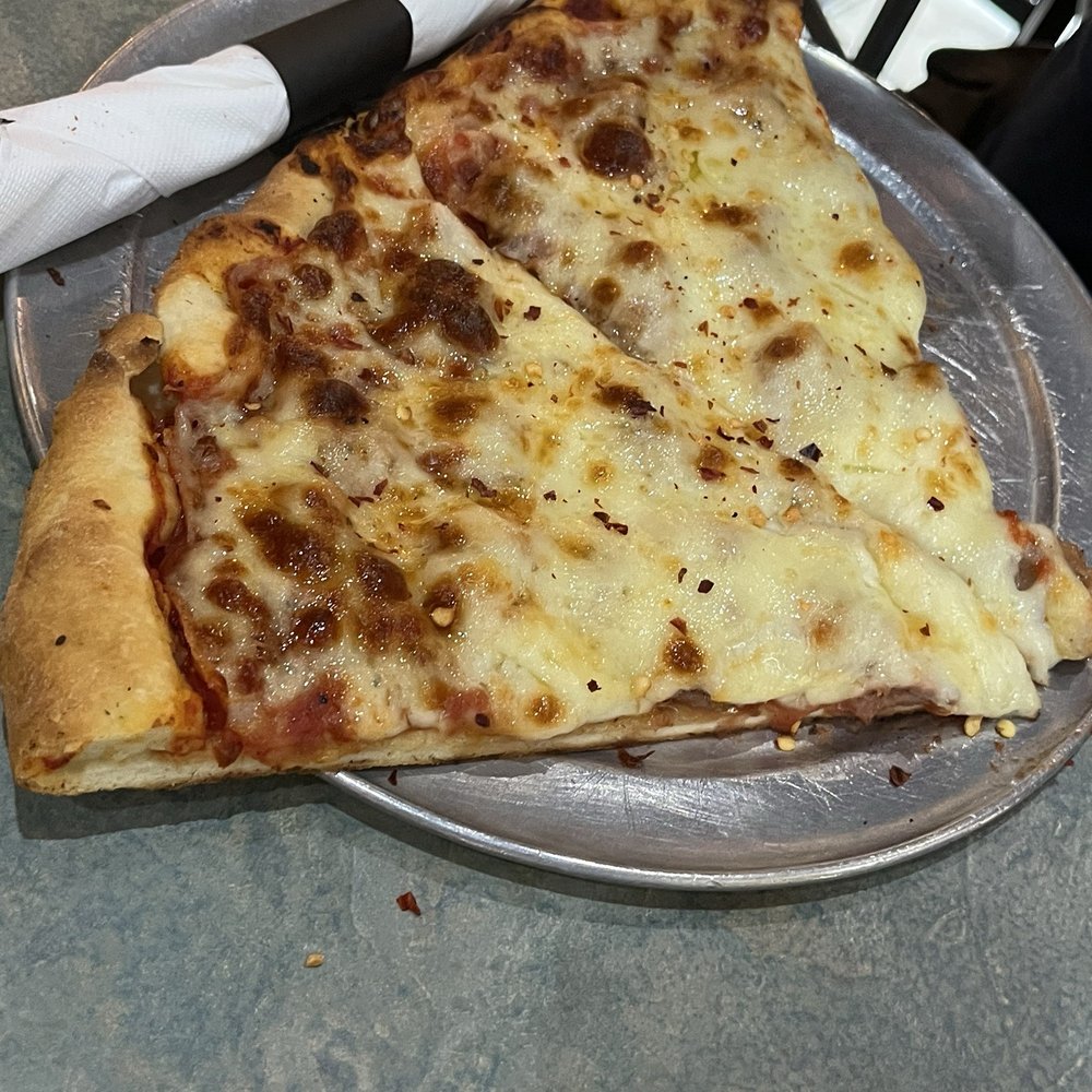 Falco's Pizza - Sausage Pizza Slice - Pizza Near Me - Burr Ridge, Illinois Falco's Pizza - Sausage Pizza Slice - Pizza Near Me - Burr Ridge, Illinois
