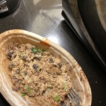 Chipotle Mexican Grill - Chicken bowl & Carnitas rice black beans, sour cream cheese, lettuce!  What the hell is this? - Mexican Near Me - Bethesda, Maryland