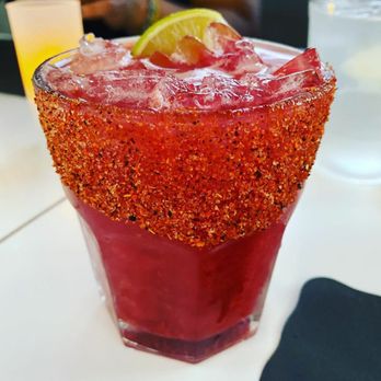 Maisonetta - The Frida cocktail. The spicy salt on the rim is everything! - French Near Me - Bronx, New York