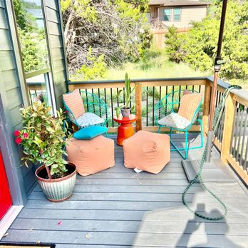 Elbow Room - a patio with a table and chairs - General Contractors Near Me Elbow Room - a patio with a table and chairs - General Contractors Near Me
