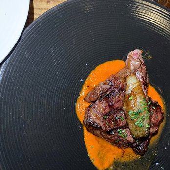 Veranda - The Grilled Ribeye with roasted shallots, Romesco, and herb garlic butter - Breakfast & Brunch Near Me - Las Vegas, Nevada