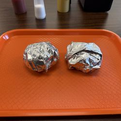 D Dogs - Sliders ( 2 for $5 ) looks different compared to the photo on the menu