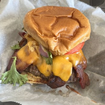 The Rustic Bluebird - Bacon cheeseburger. Honestly so so good. Love the poutine fries too - American Near Me - Almont, Michigan
