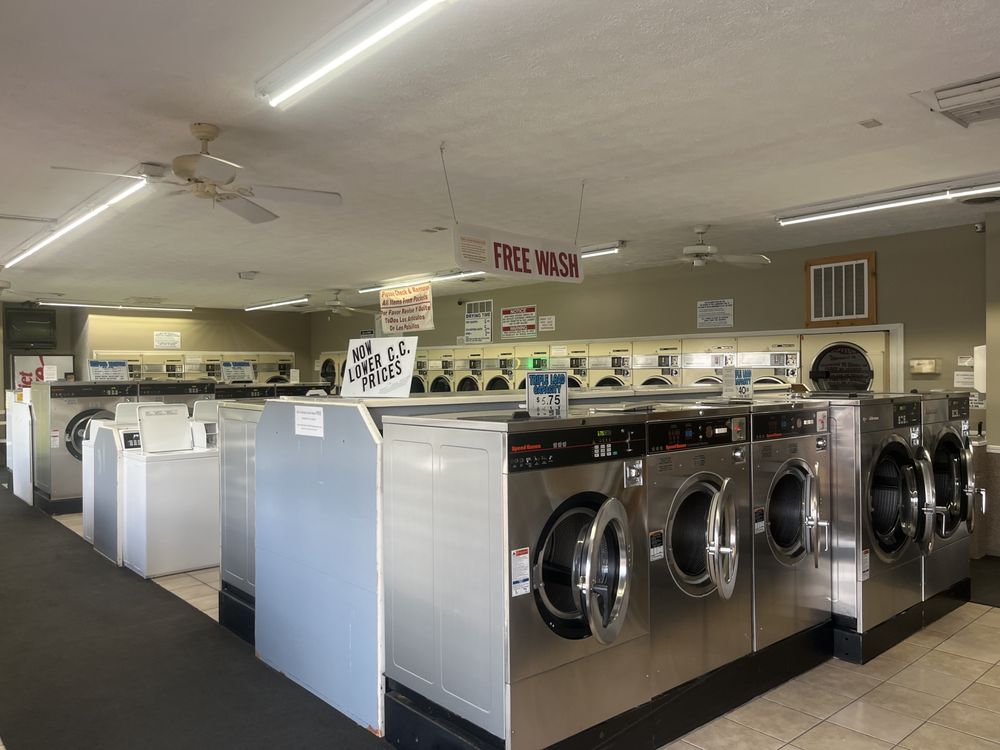 Laundry Works & Ultra Tanning Logo
