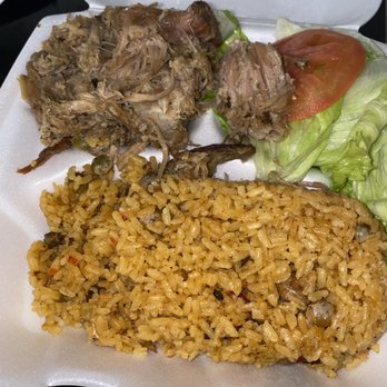 Raices Restaurant Coffee & Bar - Pernil con arroz y gandules. Slow roasted pork with yellow rice and pigeon peas. - Puerto Rican Near Me - Mesa, Arizona Raices Restaurant Coffee & Bar - Pernil con arroz y gandules. Slow roasted pork with yellow rice and pigeon peas. - Puerto Rican Near Me - Mesa, Arizona
