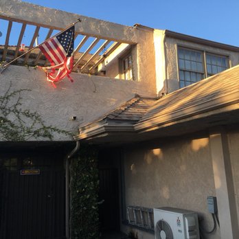 Public Storage - Tattered American flag.  Business owner/manager claims to have no connection to business- an outright lie . - Self Storage Near Me - Huntington Beach, California