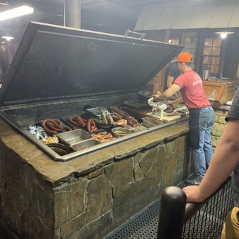 Hard Eight BBQ - Yum even with fan debris possibly falling here. - Barbeque Near Me - Stephenville, Texas