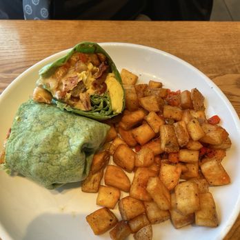 Roots Seasonal Cuisine - COWBOY BREAKFAST BURRITO & potatoes - New American Near Me - Lee's Summit, Missouri