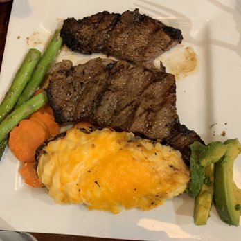 Gages Steak House - Ribeye well done, twice baked potato, carrots and asparagus (and the avocado off my salad) - Steakhouses Near Me - Guthrie, Oklahoma Gages Steak House - Ribeye well done, twice baked potato, carrots and asparagus (and the avocado off my salad) - Steakhouses Near Me - Guthrie, Oklahoma