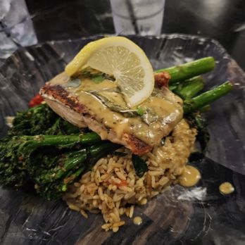 Per Se - Grilled salmon over Broccolini and wild rice. Very tasty, and the salmon was cooked perfectly. - Salad Near Me - Douglasville, Georgia
