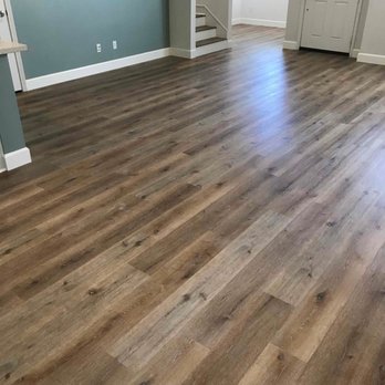 Simplified Countertops & Flooring - Main living area with new flooring - Flooring Near Me Simplified Countertops & Flooring - Main living area with new flooring - Flooring Near Me