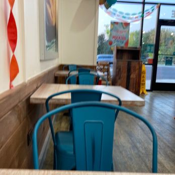 Tropical Smoothie Cafe - Table facing door. - Juice Bars & Smoothies Near Me - Murfreesboro, Tennessee Tropical Smoothie Cafe - Table facing door. - Juice Bars & Smoothies Near Me - Murfreesboro, Tennessee