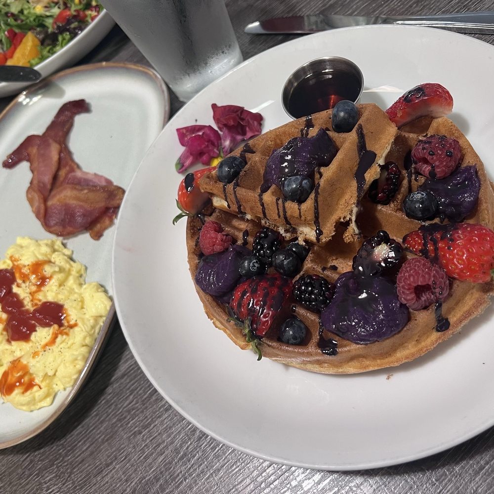 The Brunch House - UBE Ube' Waffle with a Twist combo with egg and bacon - Breakfast & Brunch Near Me - Temecula, California The Brunch House - UBE Ube' Waffle with a Twist combo with egg and bacon - Breakfast & Brunch Near Me - Temecula, California