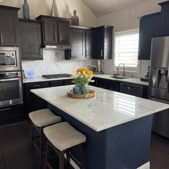 Granite Design Center - Quartzite with marble backsplash. - Cabinetry Near Me - Richardson, Texas Granite Design Center - Quartzite with marble backsplash. - Cabinetry Near Me - Richardson, Texas