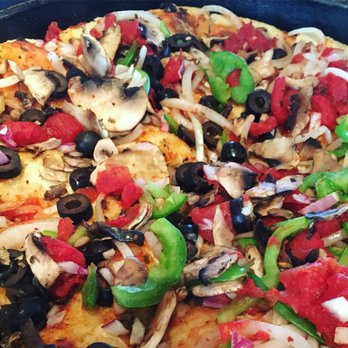 BJ's Restaurant & Brewhouse - Vegetarian pizza, no cheese. 2nd pizza,but 3rd attempt to making our order correctly. Happy it wasn't made w/cheese. Delicious! - New American Near Me - Oxnard, California