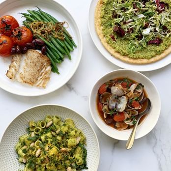 Maddox Lane - three plates of food on a table - Food Delivery Services Near Me