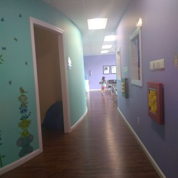 Kids Zone Dental - The little movie room with cute beanbags. - Orthodontists Near Me - Oxford, Massachusetts