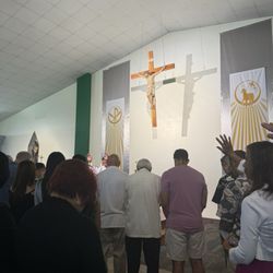 St. Jude Catholic Church - Our fathers stand at the altar's front, receiving their prayer of blessing from our priest.
