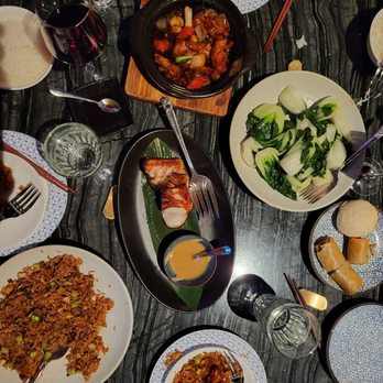 Mott 32 - Duck fried rice, grilled cod, chicken with 3 sauces, pork buns, wild mushroom spring rolls, bok choy - Chinese Near Me - Las Vegas, Nevada Mott 32 - Duck fried rice, grilled cod, chicken with 3 sauces, pork buns, wild mushroom spring rolls, bok choy - Chinese Near Me - Las Vegas, Nevada