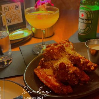 Fumée  - Spicy Garlic Park Wings & Mango Lemon Drop - Cocktail Bars Near Me - Charlotte, North Carolina