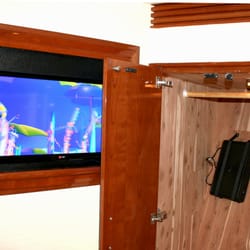 Amplex Technology Services - New TV, retro-fit into custom enclosure with DirecTV Marine HD DVR hidden in the adjoining closet on-board a 65' Carver Marquis.