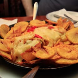 Cod with potatoes and tomatoes