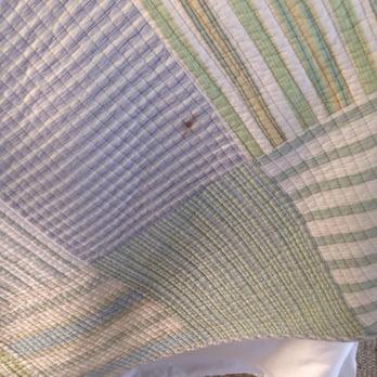 Balinese Flats - Stain on bed blanket - Hotels Near Me - Port Aransas, Texas Balinese Flats - Stain on bed blanket - Hotels Near Me - Port Aransas, Texas