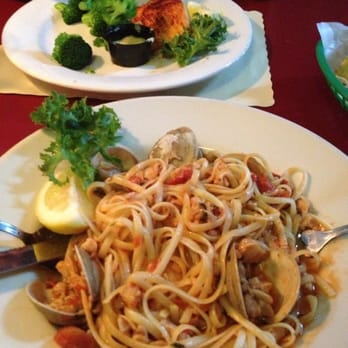 Captains Table - Linguine with red clam sauce...grilled salmon across the table :) - American Near Me - Monroe, New York Captains Table - Linguine with red clam sauce...grilled salmon across the table :) - American Near Me - Monroe, New York