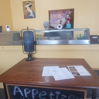 Sushi House - a table with a sign on it - Sushi Bars Near Me - Kalamazoo, Michigan Sushi House - a table with a sign on it - Sushi Bars Near Me - Kalamazoo, Michigan