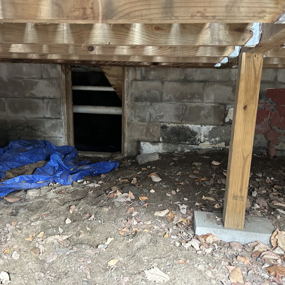 Amber Water Pros - The access to underneath house - Water Purification Services Near Me - Tully, New York