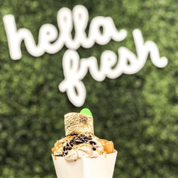 Kuma - Cookies 'n cream w/ coconut flakes and almonds - Ice Cream & Frozen Yogurt Near Me - San Antonio, Texas