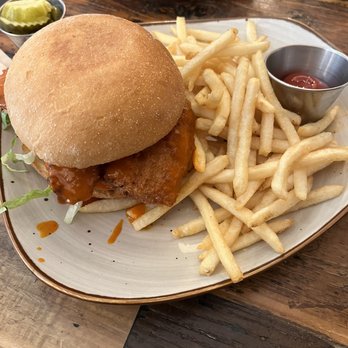 Layered - Spicy chicken sandwich with fries - Coffee & Tea Near Me - McKinney, Texas Layered - Spicy chicken sandwich with fries - Coffee & Tea Near Me - McKinney, Texas