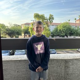 Only kid wearing a sweatshirt in 109 degrees Arizona heat!