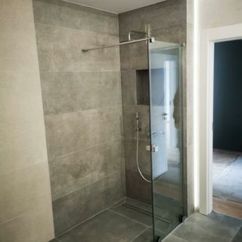 D&M Remodeling - a walk in shower - Flooring Near Me